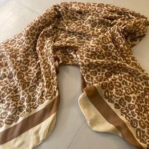 Oversized Wrap/Pareo Scarf in Abstract Print with Brown stripe on Tan Border.